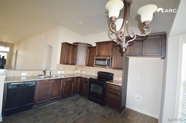 kitchen featuring backsplash, black appliances, sink, light stone counters, and dark brown cabinetry