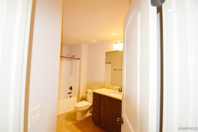 full bathroom with vanity, tub / shower combination, and toilet