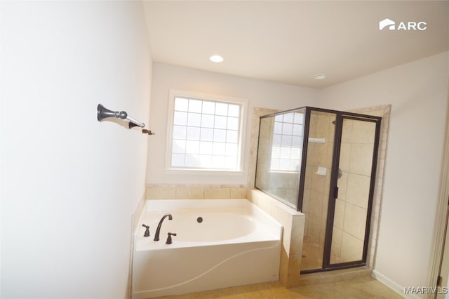 bathroom featuring tile patterned floors and plus walk in shower