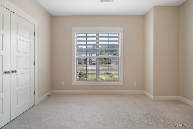 view of carpeted spare room