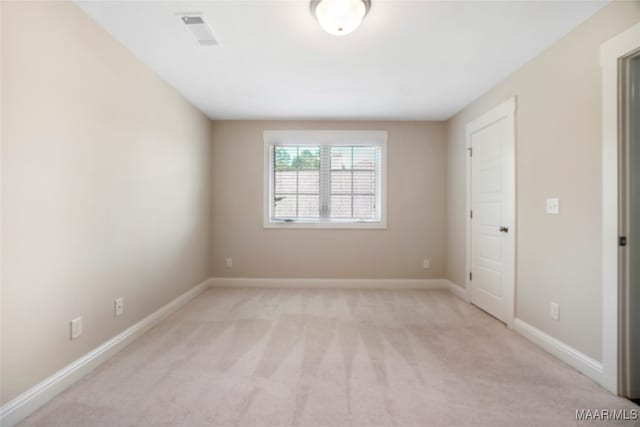 unfurnished bedroom featuring light colored carpet