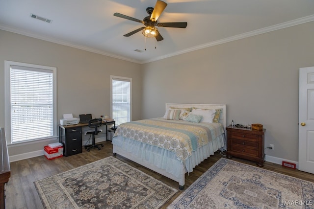 bedroom with ceiling fan, dark hardwood / wood-style floors, and ornamental molding