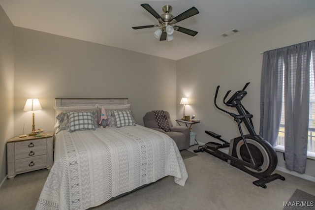 bedroom with ceiling fan and light colored carpet