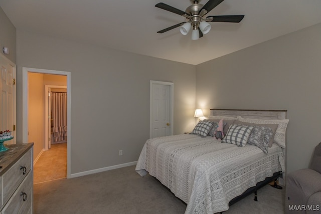 bedroom featuring ceiling fan and light carpet