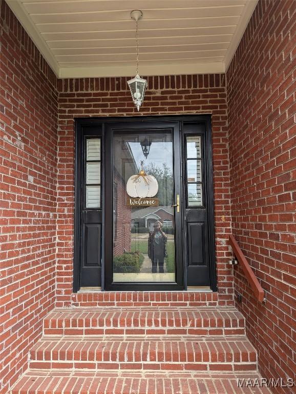 106 Crown Ridge Dr, Selma, AL 36701 - view of exterior entry featuring brick siding