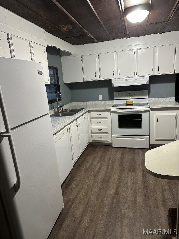 kitchen with white cabinets, white appliances, sink, and exhaust hood