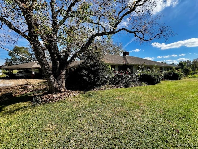 10521 US Highway 31, Hope Hull, AL 36043 - view of home's exterior featuring a yard and a chimney