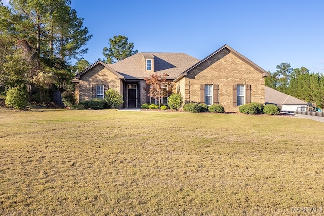 front of property featuring a front lawn