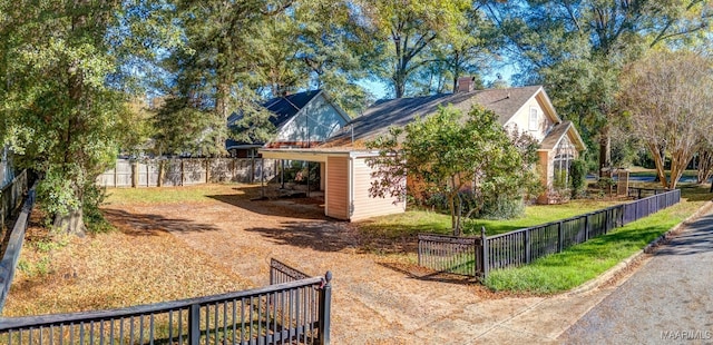 exterior space featuring a carport