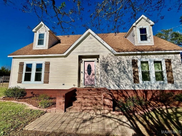 view of new england style home