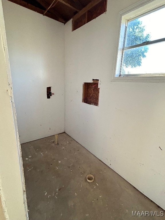 interior space featuring concrete flooring