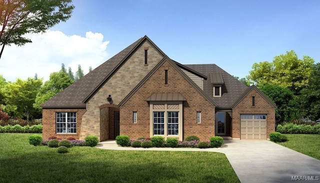 view of front of home with a garage and a front lawn