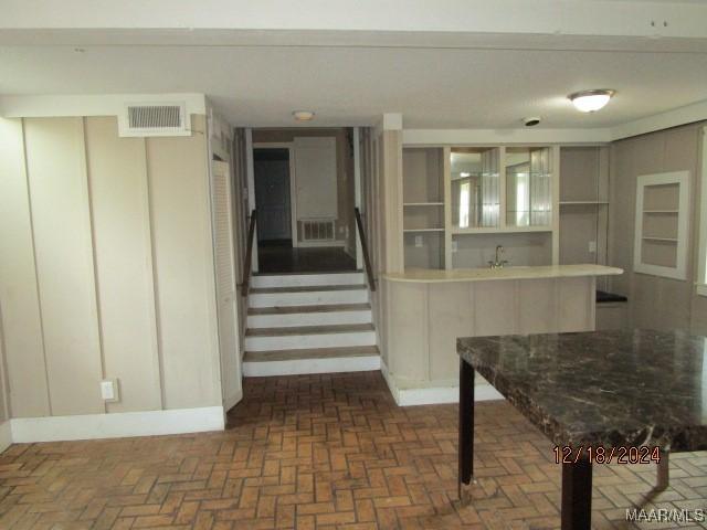 kitchen featuring gray cabinets