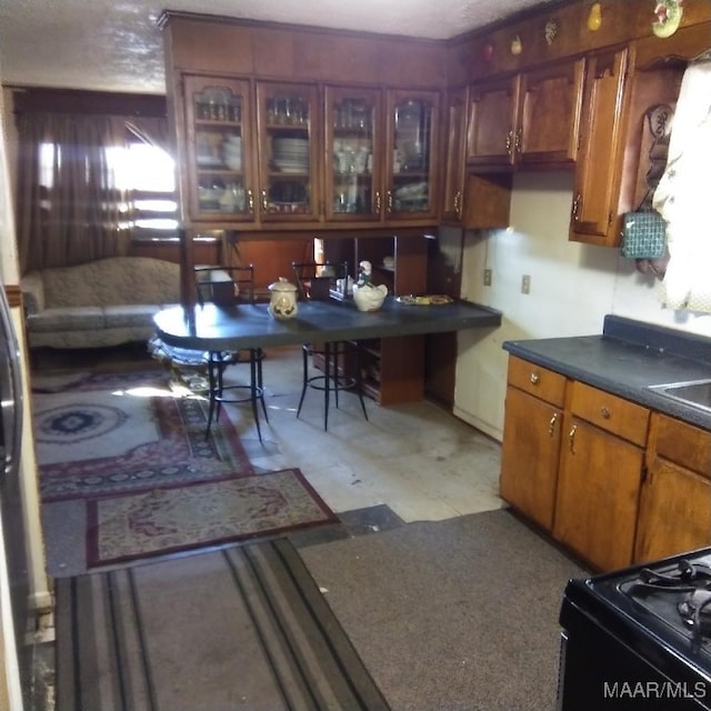 kitchen featuring a textured ceiling