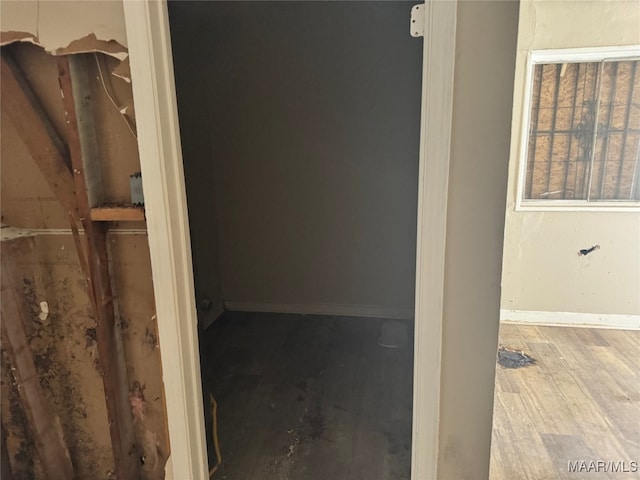 corridor featuring hardwood / wood-style flooring