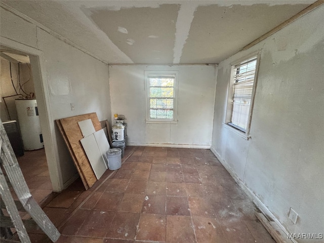 interior space featuring water heater and plenty of natural light