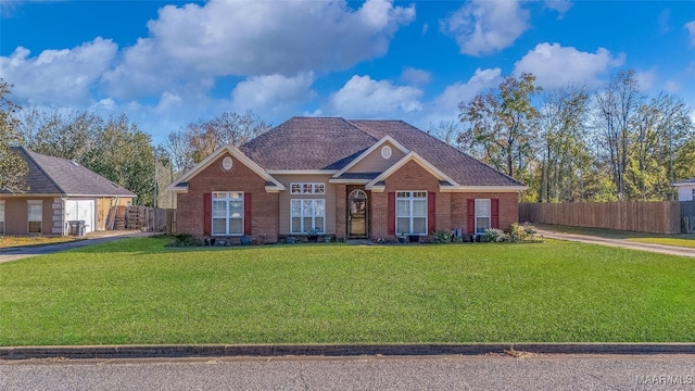 view of front of property with a front lawn