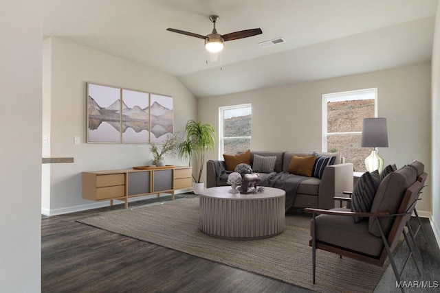 living room with ceiling fan, dark hardwood / wood-style floors, and lofted ceiling