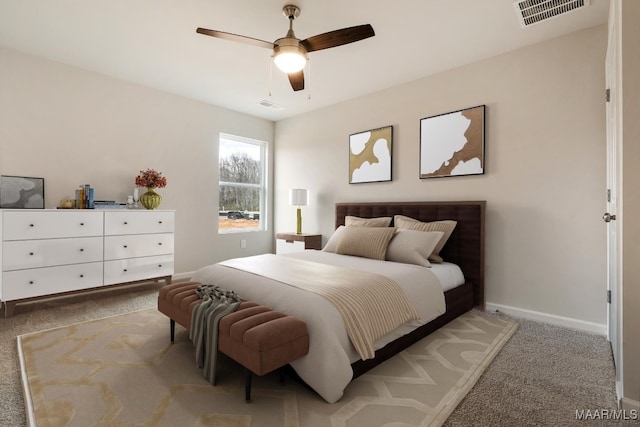 carpeted bedroom featuring ceiling fan