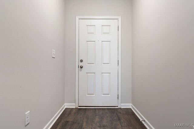 doorway to outside featuring dark hardwood / wood-style flooring