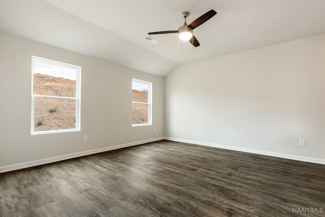 spare room with ceiling fan and vaulted ceiling