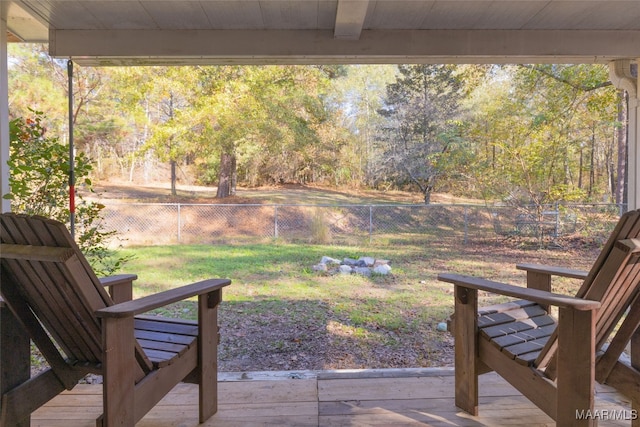 wooden deck with a yard