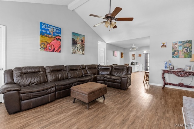 living area featuring baseboards, ceiling fan, wood finished floors, beamed ceiling, and high vaulted ceiling