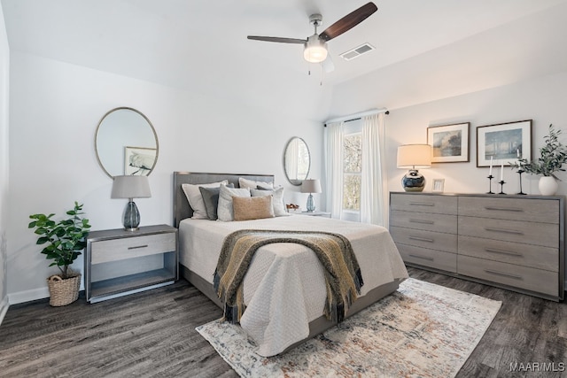 bedroom featuring ceiling fan and dark hardwood / wood-style flooring