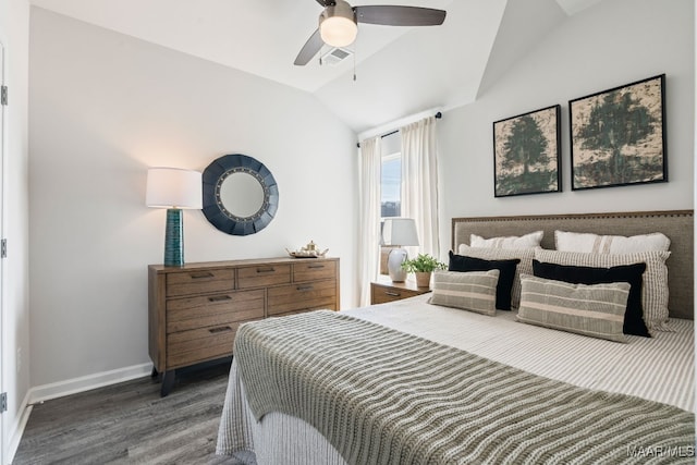 bedroom featuring ceiling fan, lofted ceiling, and dark wood-type flooring