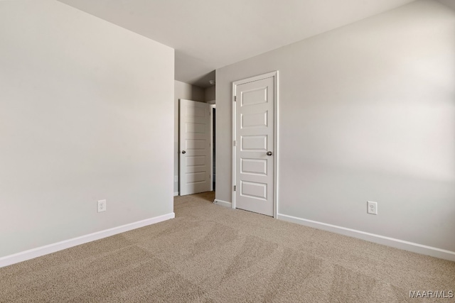 unfurnished room featuring carpet floors