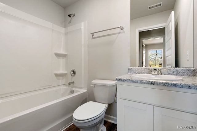 full bathroom with toilet, vanity, and bathing tub / shower combination