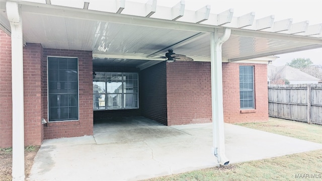 view of patio / terrace featuring ceiling fan