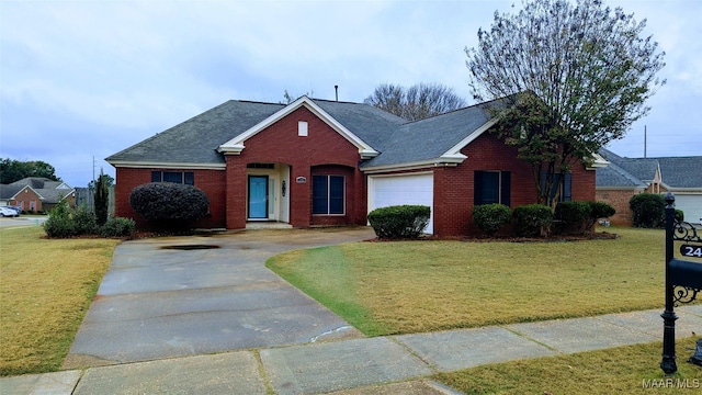 view of front facade with a garage and a front yard