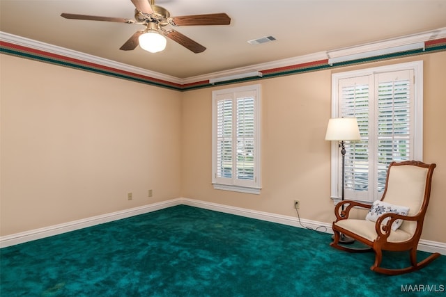 unfurnished room featuring carpet flooring, ceiling fan, and crown molding