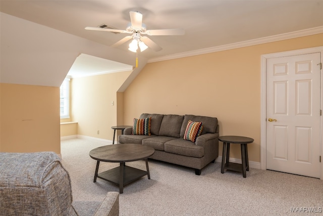 living room featuring light colored carpet, ceiling fan, and ornamental molding