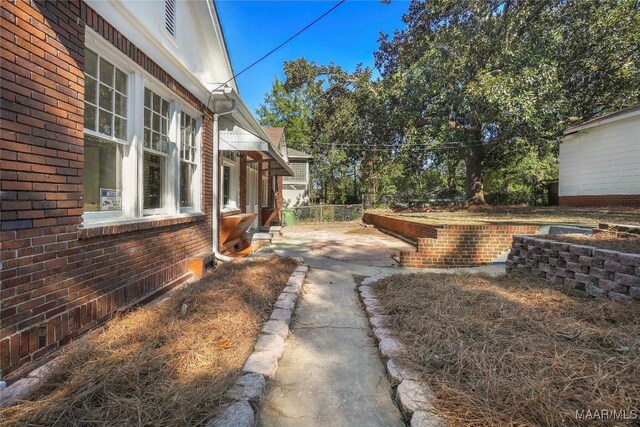1427 S Court St, Montgomery, AL 36104 - view of yard featuring a patio area