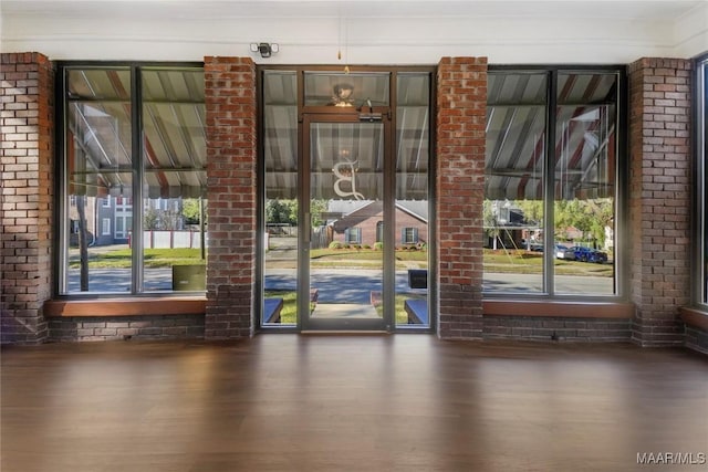 1427 S Court St, Montgomery, AL 36104 - doorway with plenty of natural light and wood finished floors