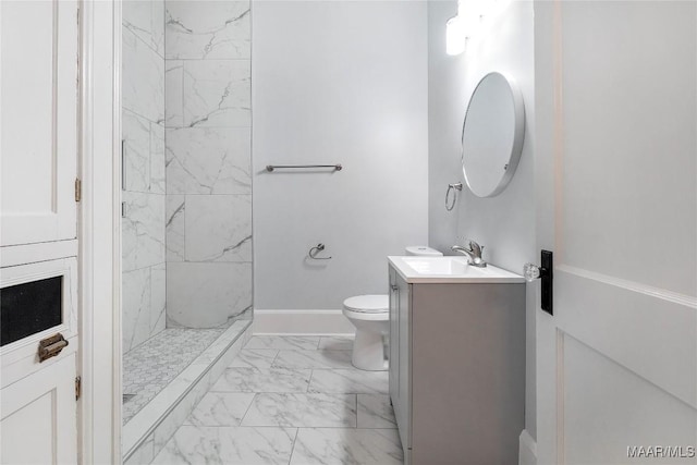 1427 S Court St, Montgomery, AL 36104 - full bathroom featuring marble finish flooring, vanity, toilet, a marble finish shower, and baseboards