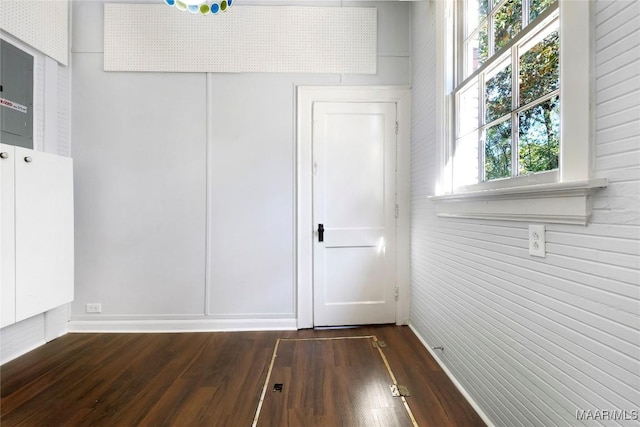 1427 S Court St, Montgomery, AL 36104 - empty room with dark wood-style floors and baseboards