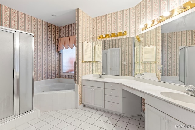 bathroom featuring tile patterned flooring, vanity, and shower with separate bathtub