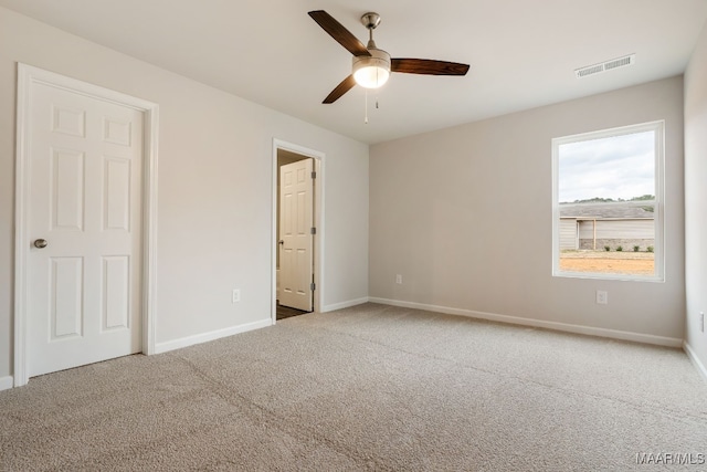 unfurnished bedroom with carpet and ceiling fan