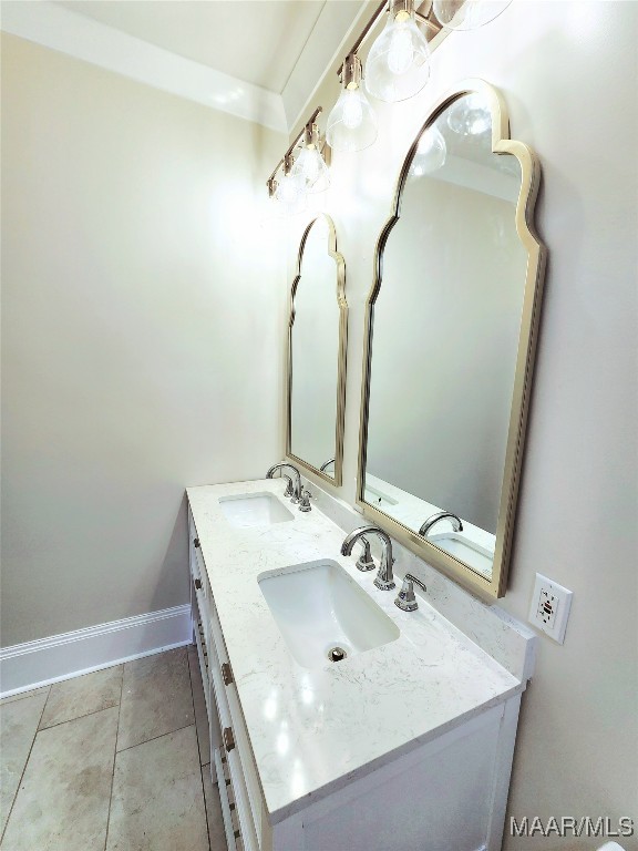 bathroom with vanity and tile patterned floors