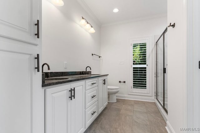 2524 Crenshaw Close Ct S, Montgomery, AL 36106 - full bath featuring a stall shower, ornamental molding, toilet, double vanity, and baseboards