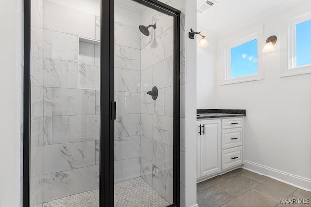 2524 Crenshaw Close Ct S, Montgomery, AL 36106 - bathroom with a stall shower, baseboards, and vanity