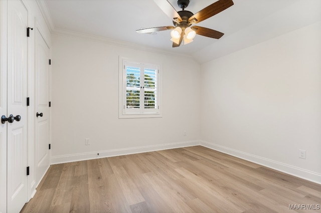 unfurnished room with light hardwood / wood-style floors, ceiling fan, and ornamental molding