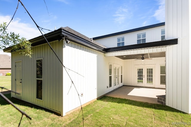 back of house with a yard, a patio area, ceiling fan, and french doors