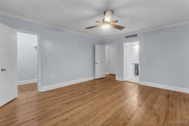 spare room with ceiling fan, light hardwood / wood-style floors, and crown molding