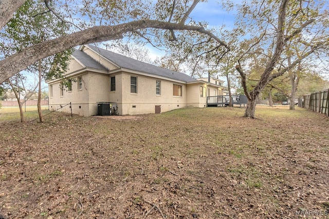 view of property exterior featuring a deck and central air condition unit