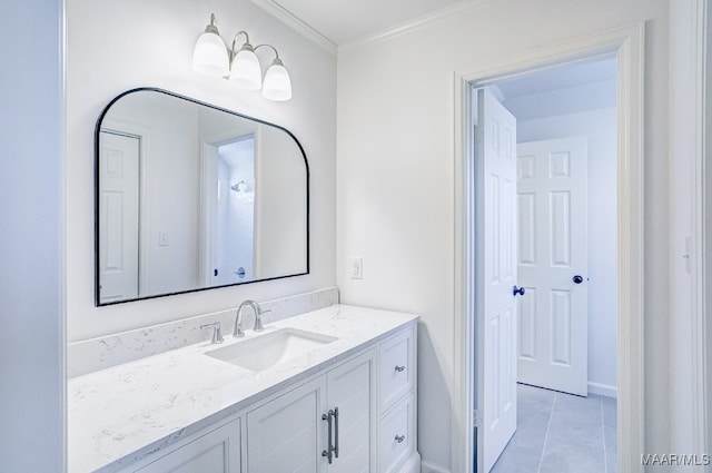 bathroom featuring vanity, tile patterned floors, and ornamental molding