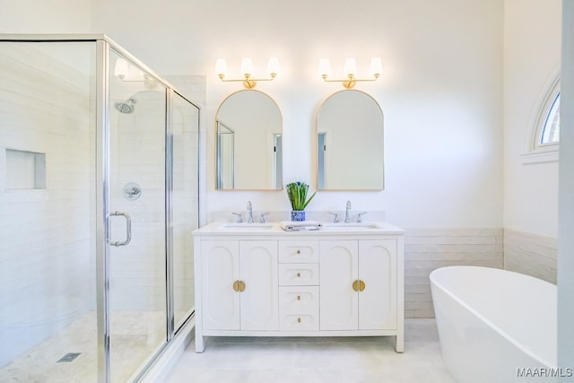 bathroom with vanity, shower with separate bathtub, and tile patterned flooring